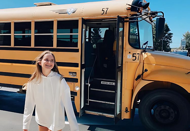 Girl with a school bus